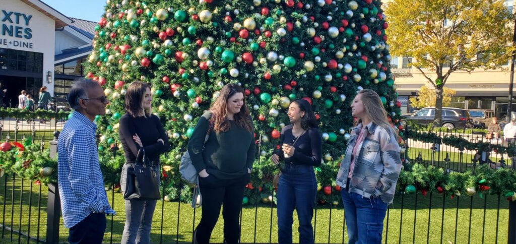 itvibes team laughing at christmas lunch in the woodlands, texas